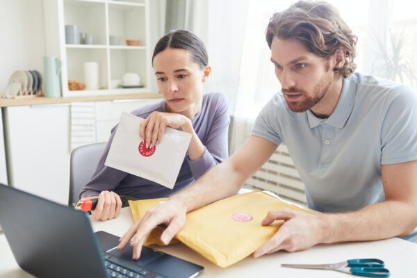 Couple checking their email