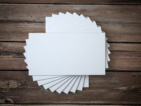 White blank business cards mockup template on the wooden table.