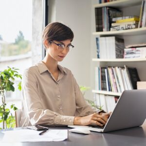 Young woman working on laptop